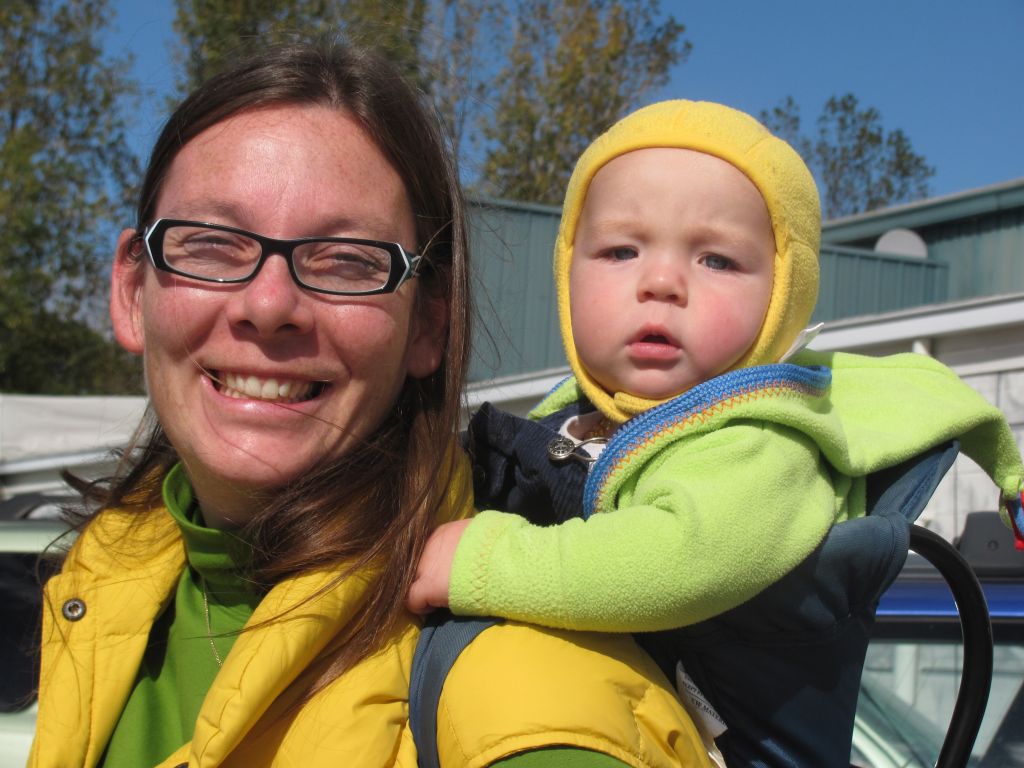 Woman wearing her baby on her back