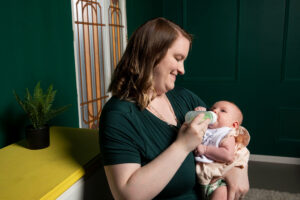 Jessica from Gold Coast Doulas bottle feeding an infant
